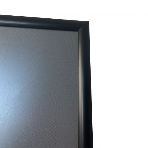 Closeup of a durable wooden easel with large snap frame 