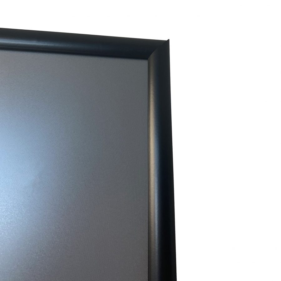 Closeup of a durable wooden easel with large snap frame 