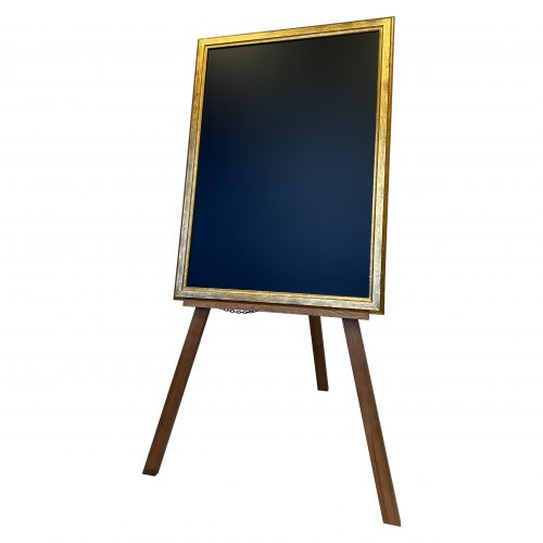 A durable wooden easel with a framed chalkboard for promotions and information sharing