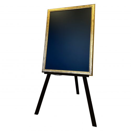 A durable wooden easel with a framed chalkboard for promotions and information sharing