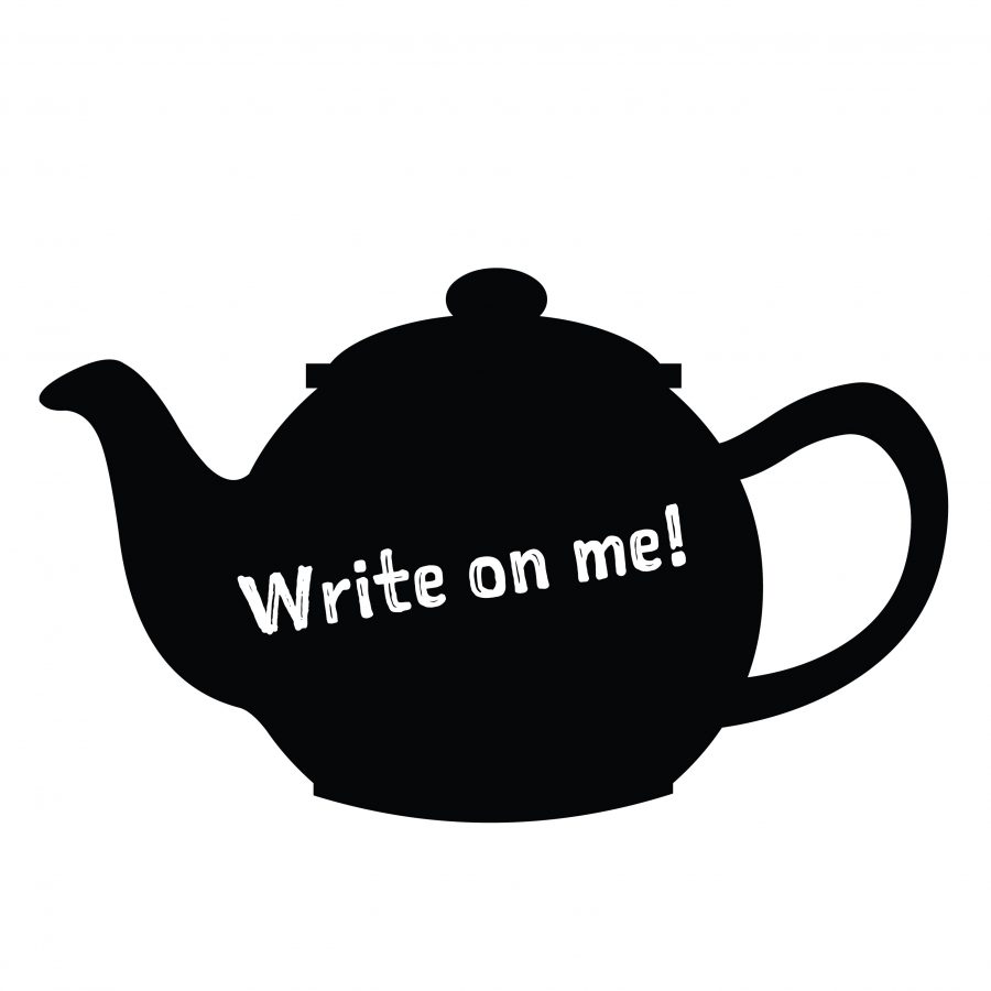 A teapot shaped chalkboard that can be written on with chalkpen