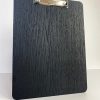 Black wooden clipboard with clip