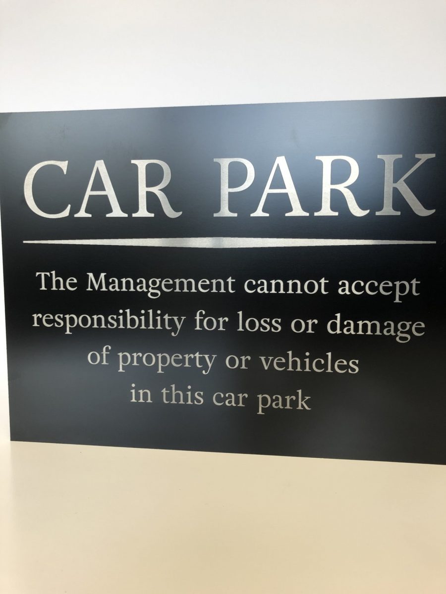 A car park disclaimer notice for use in outdoor car park areas