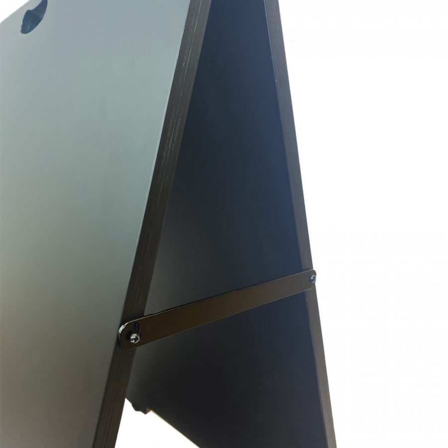 A chalkboard pavement sign with cutout hole for a handle