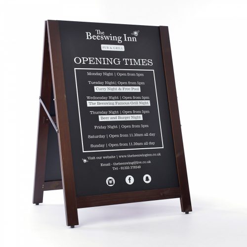 Pavement sign with chalkboards that slot out and can be reversed showing optional printed side