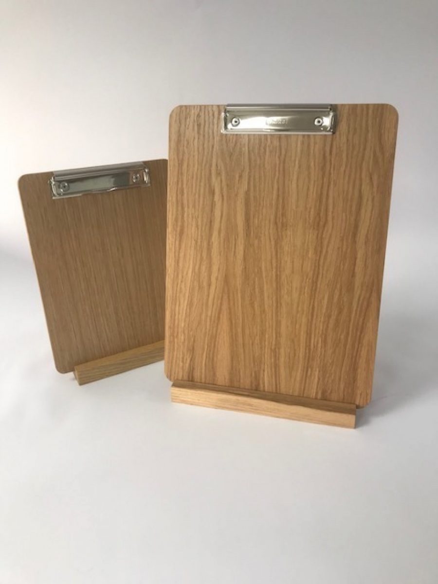 A storage base for storing many clipboards including clipboards and clips