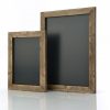 A wooden poster frame for displaying posters with a distressed finish