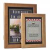 2 wooden frames for displaying posters