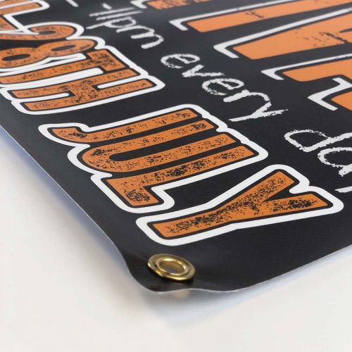 A vinyl printed banner with brass eyelets for fixing