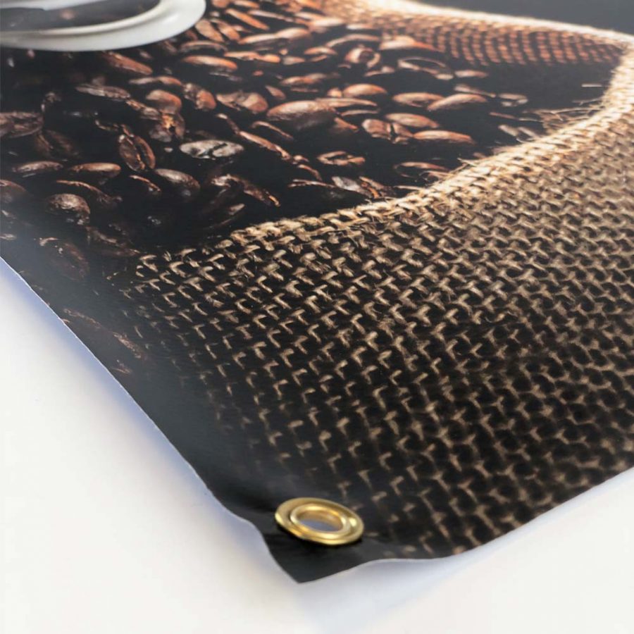 A vinyl printed banner with brass eyelets for fixing