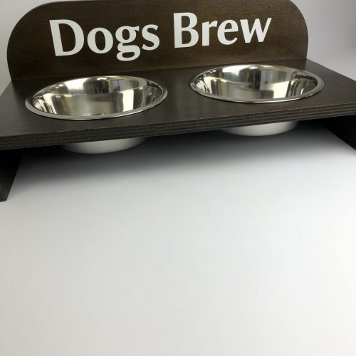 A raised dog bowl wooden holder