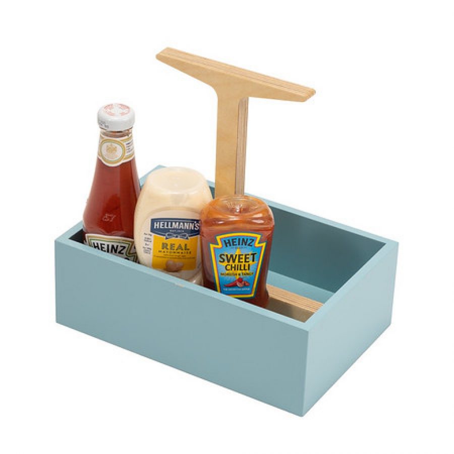 A painted wooden box holding condiments natural wood handle