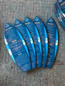 Collection of surfboard shaped menu for a bar