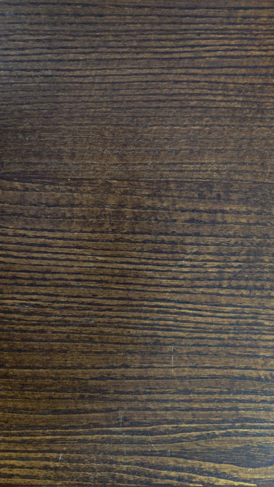 Closeup of wood grain used in the freestanding wine stand